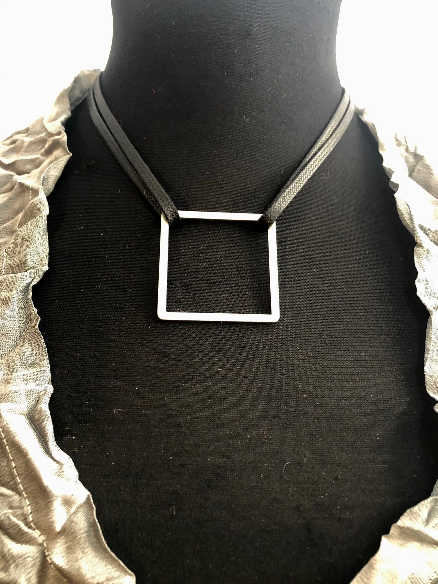 A Silver Box Neck Piece